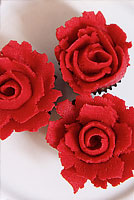Buttercream red rose cupcakes.